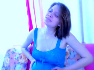 Busty curly brunette with big boobs fucks on couch