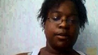 Ebony shows big tits on webcam