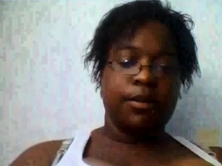 Ebony shows big tits on webcam