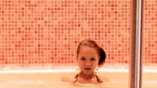 Teen Paris Milan takes Jacuzzi